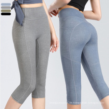 In Stock Sport Leggings hohe Taille Frauen Seitentasche Fitness Yogahosen mit Taschendehnungs -Yoga Capri Legging